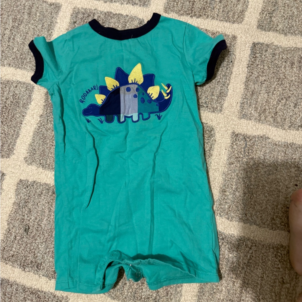 Never worn smocked Dino romper